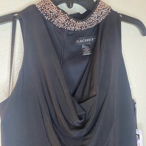 Floor length black dress with scoop neck line & gold beaded detailing on collar